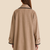 Stylowe ponczo damskie z kapturem i guzikami – eleganckie okrycie na jesień i zimę