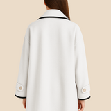 Stylowe ponczo damskie z kapturem i guzikami – eleganckie okrycie na jesień i zimę