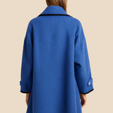 Stylowe ponczo damskie z kapturem i guzikami – eleganckie okrycie na jesień i zimę