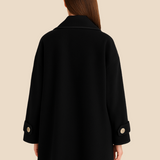 Stylowe ponczo damskie z kapturem i guzikami – eleganckie okrycie na jesień i zimę