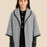 Stylowe ponczo damskie z kapturem i guzikami – eleganckie okrycie na jesień i zimę