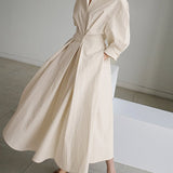 Elegancka sukienka koszulowa maxi z paskiem w talii