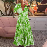 Zwiewna sukienka maxi w kwiaty z dekoltem V – elegancka i kobieca