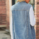 Damska długa kamizelka jeansowa z kieszeniami