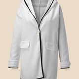 Stylowe ponczo damskie z kapturem i guzikami – eleganckie okrycie na jesień i zimę