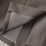 Damska elegancka marynarka z paskiem w talii