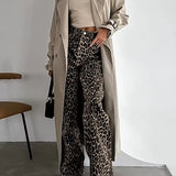 Damskie spodnie w panterkę z szeroką nogawką