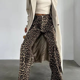Damskie spodnie w panterkę z szeroką nogawką