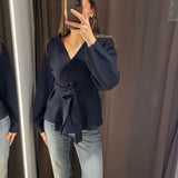 Damska elegancka bluzka z wiązaniem w talii i dekoltem V