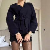 Damska elegancka bluzka z wiązaniem w talii i dekoltem V