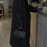 Elegancki długi płaszcz damski oversize z wełną