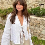 Lniana bluza damska z wiązaniem – lekka narzutka boho