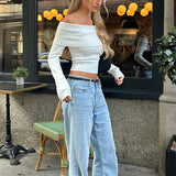 Sweter damski z odkrytymi ramionami – elegancki model hiszpanka