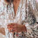 Bluzka damska z cekinami i kopertowym dekoltem