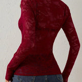 Koronkowe body damskie z długim rękawem i dekoltem V