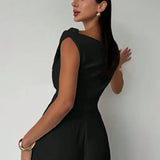 Elegancki top damski z odkrytymi ramionami i drapowaniem