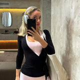 Bluzka kopertowa z długim rękawem i wiązaniem