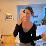 Bluzka kopertowa z długim rękawem i wiązaniem