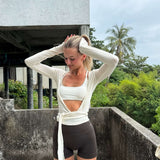 Bluzka kopertowa z długim rękawem i wiązaniem