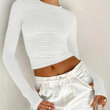 Dopasowany top damski z długim rękawem i marszczeniem