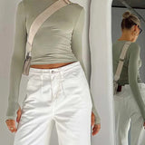 Dopasowany top damski z długim rękawem i marszczeniem