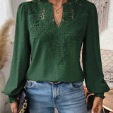 Elegancka bluzka damska z haftem i bufiastymi rękawami