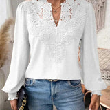 Elegancka bluzka damska z haftem i bufiastymi rękawami