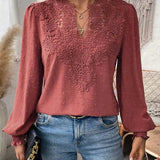 Elegancka bluzka damska z haftem i bufiastymi rękawami