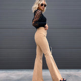 Damskie eleganckie spodnie z szeroką nogawką i wysokim stanem