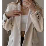 Damska elegancka marynarka o klasycznym kroju