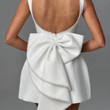 Sukienka mini z gorsetową górą i zdobionym dołem