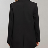 Damska marynarka oversize z guzikami i kieszeniami