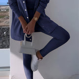 Damski komplet dresowy z odkrytym ramieniem i joggerami