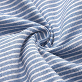 Lniana sukienka w paski z guzikami – letnia i wygodna midi